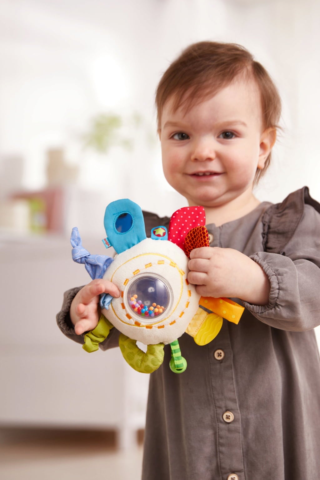 HABA Cuscino da Gioco Arcobaleno Divertente - 1 pz.