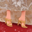 Signature 2025 Holiday Barbie - Eleganza in oro e argento